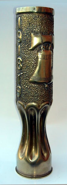 Shell Liberty Bell, flanked by 1918-19 and France, on a fluted shape.