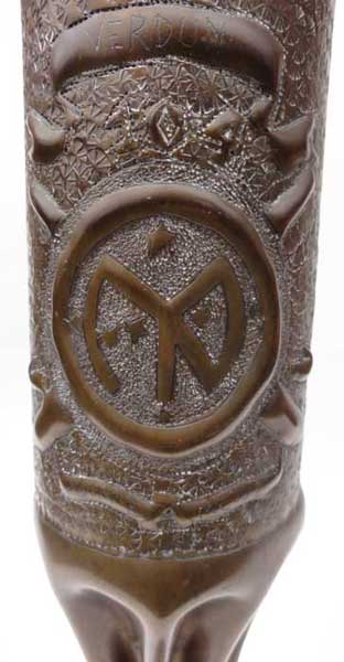 Insignia of letters N and Y combined in a circle with the seven stars of Orion, body fluted, tiny spoke circles patterns