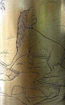 Shell depicting LION OF FLANDERS protecting the Belgium flag while spotting the German Eagle.Banner:"Souvenir de la Guerre 1914".