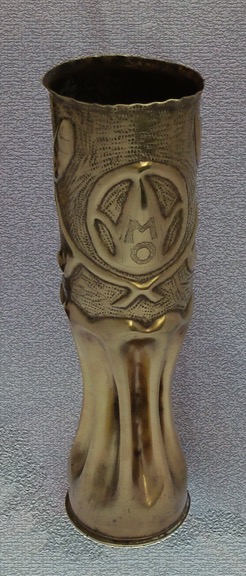 Shell 89th Division with initials MO [Missouri] framed by a wreath and fluted