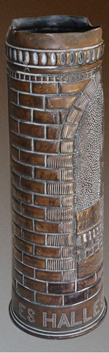 Shell Ypres Cloth Hall 1914 , center part of the building ina medallion&nbsp; with grooved stones and brickwork at the back.