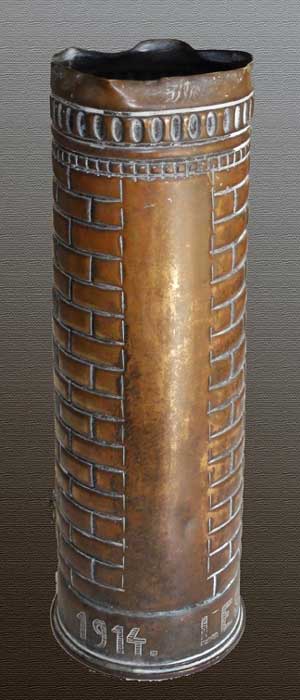 Shell Ypres Cloth Hall 1914. Top with decorative band, course of header bricks.