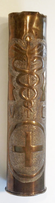 Veterinary Corps shell with Caduceus flanked by letters V and C above Red Cross symbol.