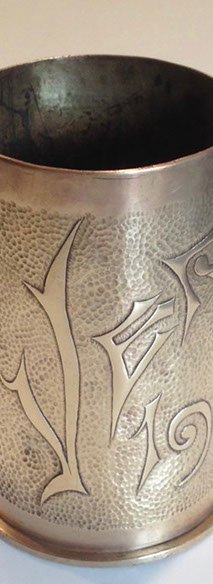 Shell VERDUN IN traditional calligraphy on an embossed background.