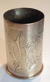 Shell VERDUN IN traditional calligraphy on an embossed background.