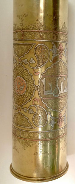 Shell decorated in DAMASCENE&nbsp; work of inlaid copper and silver and Arabian calligraphy in medallion.