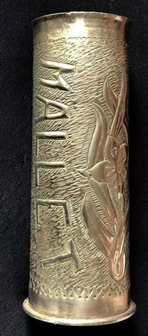 RESERVE MALLET, both words in diagonal flanking a flower in bloom