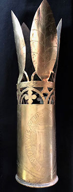 Pair of shells with honeycombed body, traces of dark paint, one with patina, the other polished.