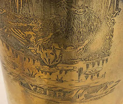 Shell's lower part is engraved with a roaring Lion of Flanders, all claws out, defending the&nbsp; flag against hovering German Eagle.