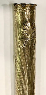 On a dappled and speckled background, with a pie crust top. Heavily varnished. H 14". Franch shell dated 1889-like the Eiffel tower.