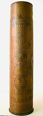 Shell engraved with Croix de guerre with three palms, ARTOIS, CHAMPAGNE, SOMME, flaming bomb with #1 and LEGION ETRANGERE