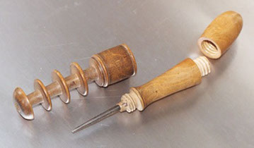 Poilu's sewing tool, unscrewed to show&nbsp; needle&nbsp; to mend shoes and top lid for keeping needles.