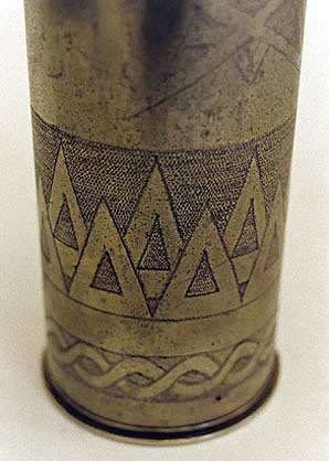 shell decorated by Emile Delsol with rows of triangles&nbsp; around the body and intertwined ribbons in lower band.