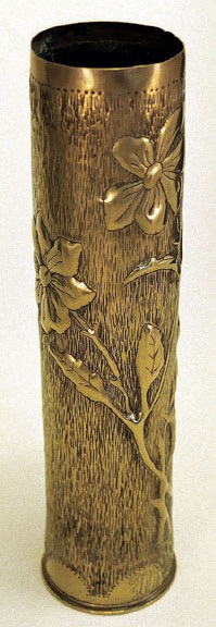 Shell with roses, prickly stems, leaves on a background with vertical indentations