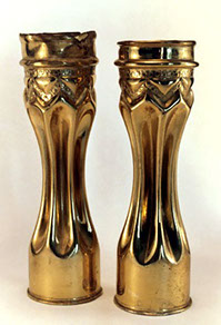 Shells fluted and varnished with a zig zag band decorated.