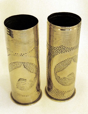 Shells celebrating "Grand Parade", winner of The Derby in 1919. Profile of horse head, engraving GRAND PARADE in oval frame