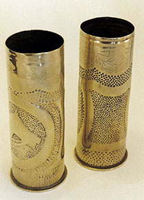 Shell with DERBY 1919 engraved on a ribbon, garland in fine zig-zag line, punches of various size in the background.