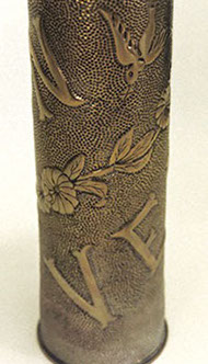 Shell engraved Verdun in diagonal, with a garland of flower and a bird bringing a message.