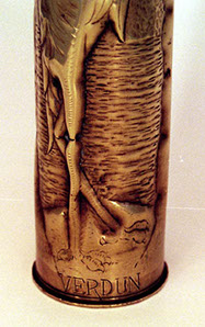 Shell with heron in a marshland, VERDUN engraved around the base. Details of toes...should be three upfront.