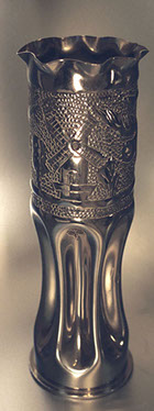 Shell with windmill, two birds,trees and clouds. Shell fluted, nickel-chromed with pie crust top.