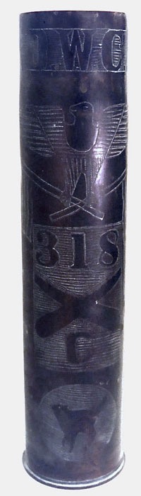 Engraved D.C.W.[identified as Daniel W. Canady from NC], US Eagle holding two flags. 318, crossed cannons, [Battery] C, Wildcat