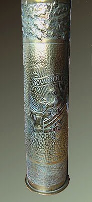 Huge shell with French Rooster proudly perched on the barrel of a 75mm F.A. gun