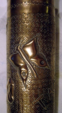 shell Tahure Champagne with butterfly hovering above flower