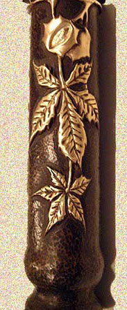 Embossed and darkened background, branch and leaves of horse chestnut, top flared.